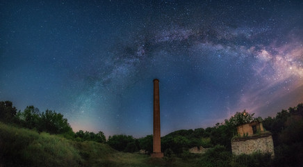 Milky way over old factory chimney