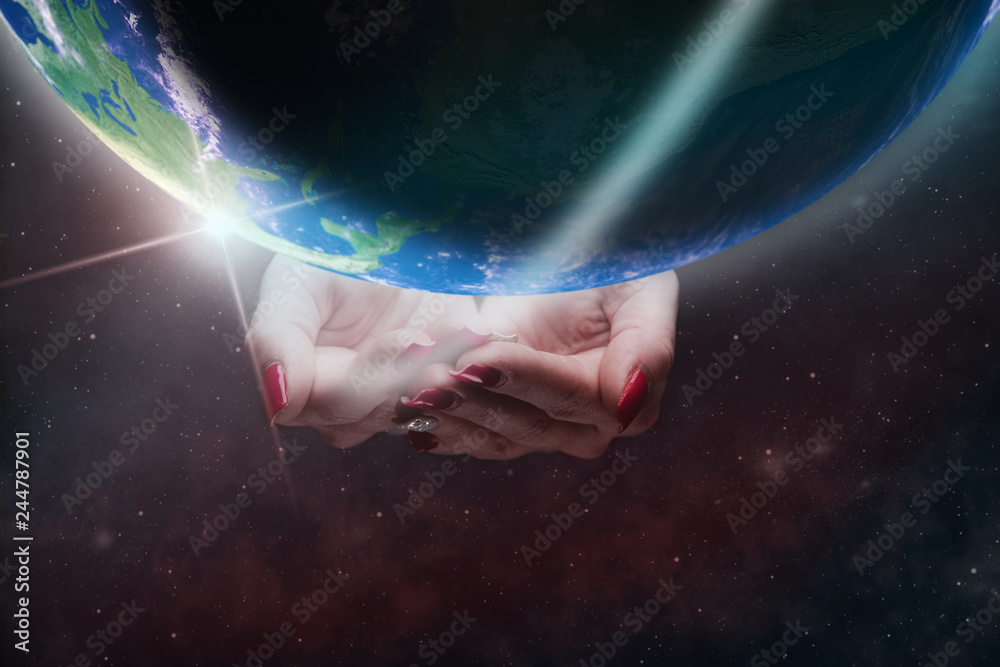 Aufkleber protect our world in woman hands and nebula dust. mixed media .elements of this image furnished by n
