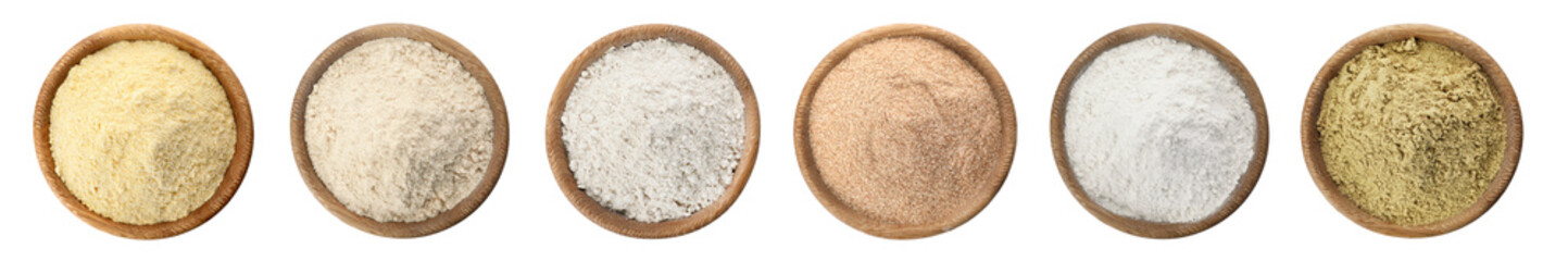 Set of organic flour in wooden bowls on white background, top view