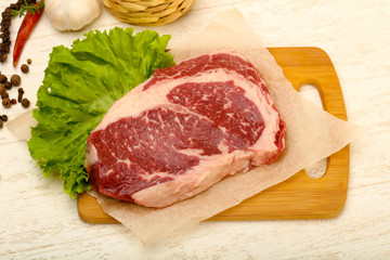 Rib eye raw steak
