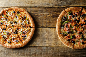 Pizza with shrimp, olives, green pepper and onion