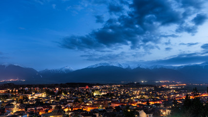 razlog city at night, pirin mountain on horizon