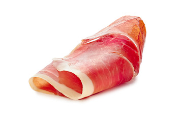 Folded jamon of ham slice on white