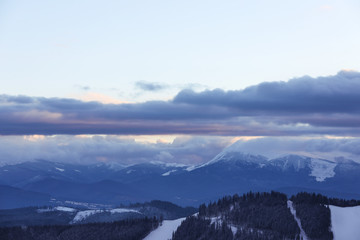 Fototapeta na wymiar Beautiful mountain landscape with forest in winter