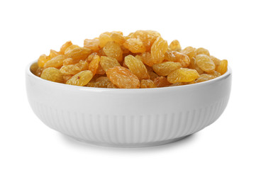 Bowl with dried golden raisins isolated on white. Healthy nutrition with fruits