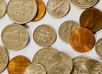 A large pile of american coins. Currency