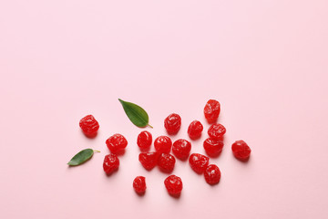 Cherries on color background, top view with space for text. Dried fruit as healthy snack