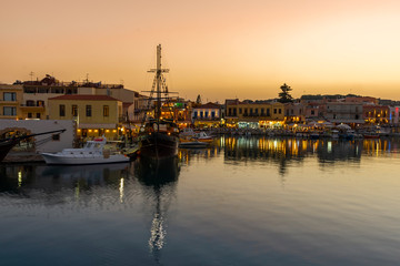 Fototapeta na wymiar Greece, Crete Rethymno, old venetian harbor at the evening.