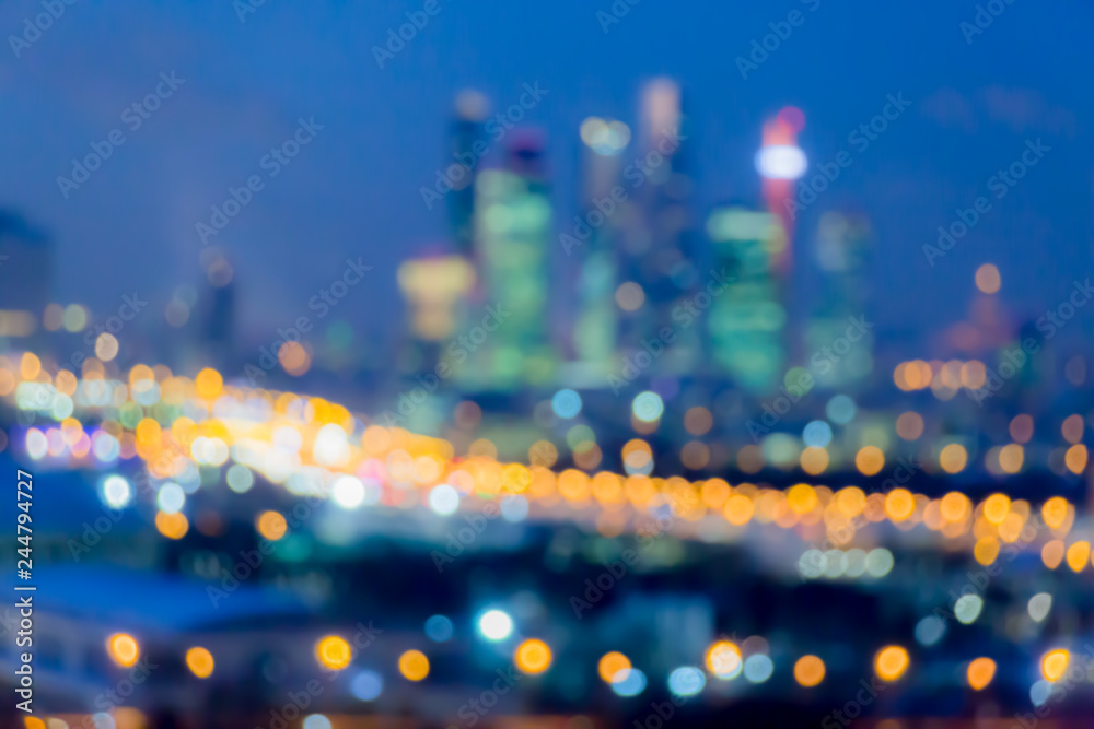 Wall mural defocused abstract image. bokeh effect. golden lights of the big city. night city landscape, lights 