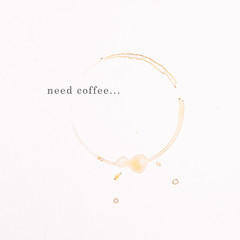 The trail from a Cup of coffee on a white background. The view from the top. "Need coffee" concept