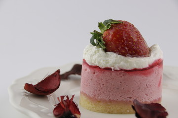 Close up Strawberry Cream Cake on White Background