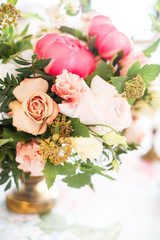 Bouquet with peach roses and pink peonies
