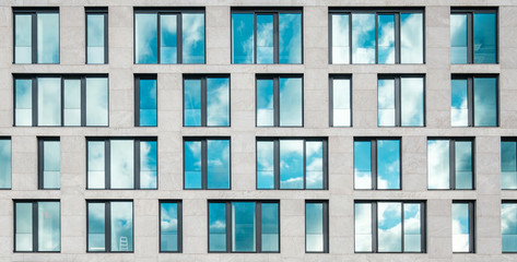 modern office building facade , window facade with sky reflection - - obrazy, fototapety, plakaty