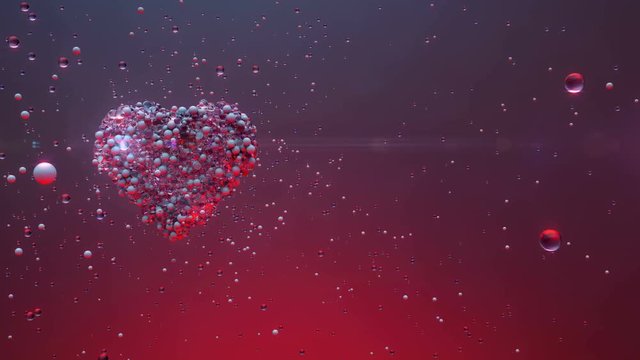 Valentines day Love intro.Shining Glass balls create valentines heart and exploding.Good for love story intro and wedding video. Valentines day present and memories.Twinkling heart.Pink,red,Purple.