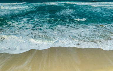 Golden sand beach from drone