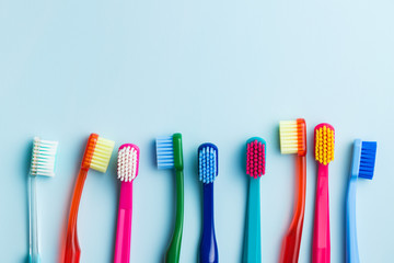 Colorful toothbrushes. - obrazy, fototapety, plakaty