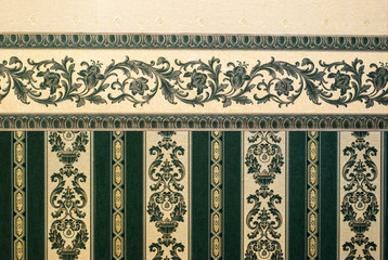 Vintage ornamental green patterns wallpaper. Victorian style backdrop.