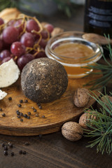 Сheese still life on wooden table