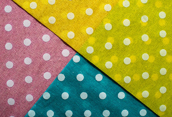 Multi Coloured background on dots. Geometric background on points.