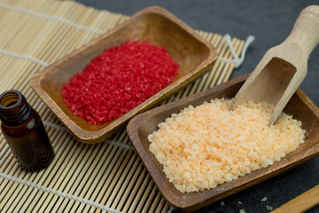 Wellness setting. Sea salt in a wooden bowl.