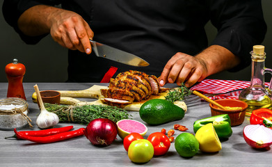 Cooking meat steak, vegetables and spices with by chef hands on wooden background. Food recipe concept