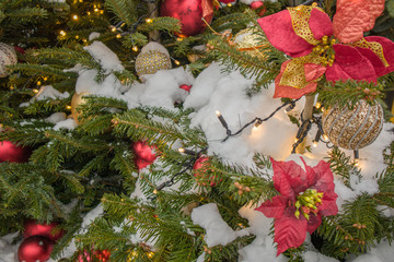 Festive Gifts Decorated with Linen Cord, Cinnamon, Pine cones, Walnuts. Toned image. Snow Drawn