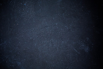 Dark grey black slate stone background or texture. Paper empty for text. Dark design is blackboard. Grunge wall, highly detailed textured background abstract with space for text or image