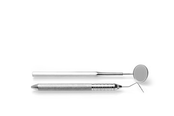 Dentist equipment tools for dental care on white background.- Image