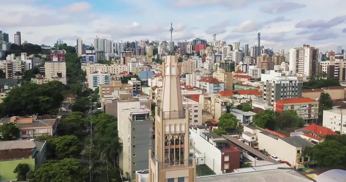 Aerial Drone Circlng Church. Surrounding Church in the Middle of a City in Brazil