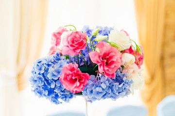 Close-up of colored flowers on the wedding table
