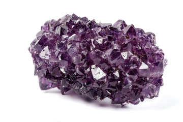 Macro mineral stone Amethysts eye crystals on white background