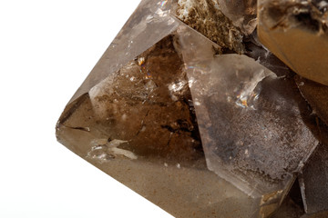 Macro mineral stone smoky quartz on a white background