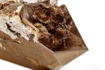 Macro mineral stone smoky quartz on a white background