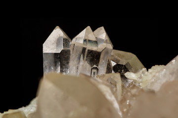 Macro mineral stone Prehnite quartz on a black background