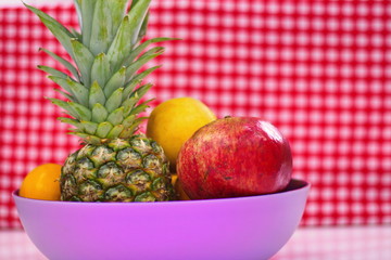 bowl on a table with fruit.-image