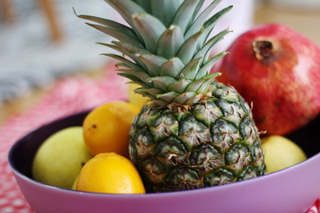 bowl on a table with fruit.-image