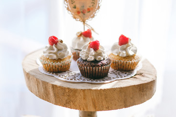 delicious beautiful dessert in cups, delicate cream with raspberries and figs, ready for distribution