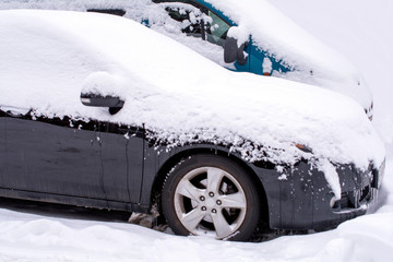 How to Dig Your Car Out of the Snow. Car stuck in snow.