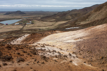 Desert landscape with a path rising up among the mountains, Krysuvík, Iceland