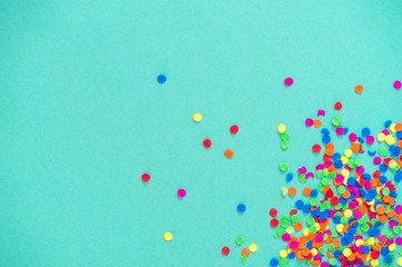 Confetti holidays decoration blue paper background