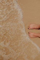 Fototapeta premium Feet in the water