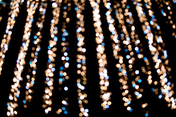 Abstract background with bokeh and defocused lights. Festive concept. 