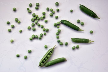 Fresh green peas on the table