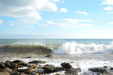 Waves on the black sea, beautiful clouds in the sky