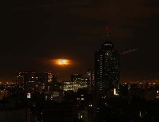 Fototapeta na wymiar Nights in Mexico City on the eve of the Blue Blood Moon phenomenon
