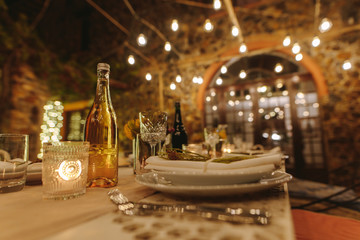 Beautiful table setting for a big party in the night