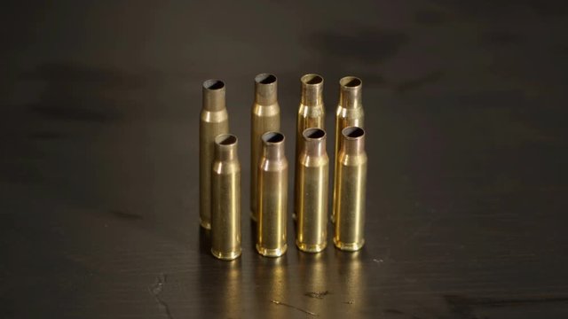 Spent .30-06 en .308 shells standing on a row