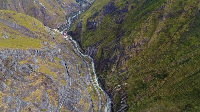 An aerial shot of a train going around the "Nariz del Diablo" or  Devil's Nose in Alaus&radic;&ne;, Chimborazo Province, Ecuador. The Devil's Nose is one of the world's most picturesque and dangerous railways.