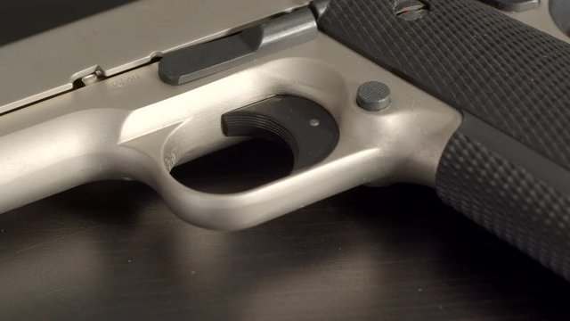 Extreme close up of pistol trigger