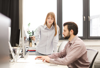 Young people working in modern office